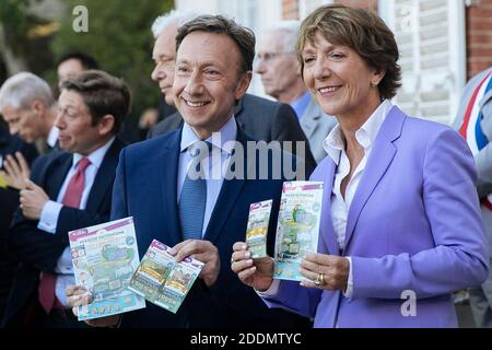 France's national lottery games operator "Française des Jeux" (FDJ), right, and French TV host and Macron's cultural special adviser Stephane Bern before their visit at the Chateau de By, the former property of the late French artist Rosa Bonheur. In support of the European Heritage Days, Emmanuel and Brigitte Macron visited the residence of the painter Rosa Bonheur, one of the emblematic projects that receive financial support from the heritage mission. The French Ministry of Culture has selected 18 emblematic sites to profit from the 'Loto du patrimoine' draw. Thomery, France on September 20 Stock Photo