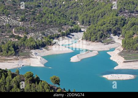 As late as October in 2014 the reservoir of Guadalest was seriously low in its water levels due to a prolonged period of dry weather. Stock Photo