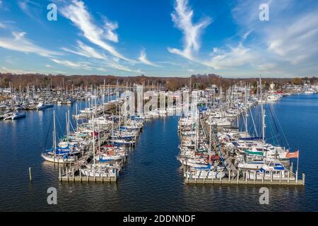 Scenic aerial panorama of Deale  waterfront docks on the Western Shore of Chesapeake Bay Maryland, dozens of luxury sailboats docking in the marina. Stock Photo