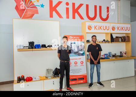 Kigali, Rwanda. 21st Nov, 2020. Staff members work at a physical store of the cross-border online shopping platform KiKUU in Kigali, capital city of Rwanda, Nov. 21, 2020. TO GO WITH 'Feature: E-commerce platform from China unleashing Rwanda's potential for cross-border shopping' Credit: Cyril Ndegeya/Xinhua/Alamy Live News Stock Photo