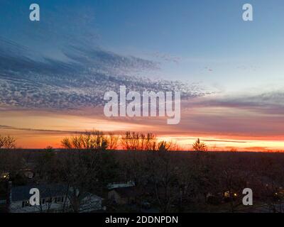 Panoramic aerial view of a beautiful sunset from above the tree tops of Old Bridge, New Jersey, with some cirrus clouds on the horizon -12 Stock Photo