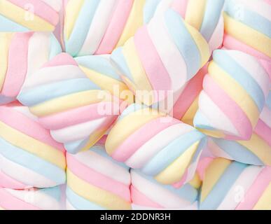 Marshmallow Pattern Background.  Pastel colored  Marshmallows sweet dessert food close-up Stock Photo