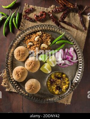 Dal bati. Spicy lentils with wheat flour bread rolls. India Food Stock Photo