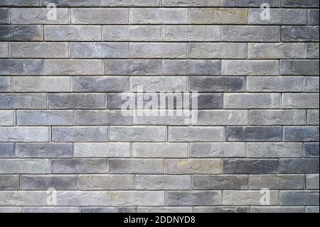 pattern of decorative gray slate stone wall surface as a background Stock Photo