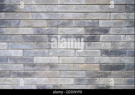 pattern of decorative gray slate stone wall surface as a background Stock Photo
