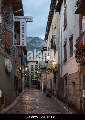 Streets of Benasque village at dusk on a rainy day in September. Huesca, Aragón, Spain Stock Photo