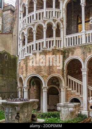 The external multi-arch spiral staircase of Palazzo Contarini del Bovolo - Venice, Veneto, Italy Stock Photo