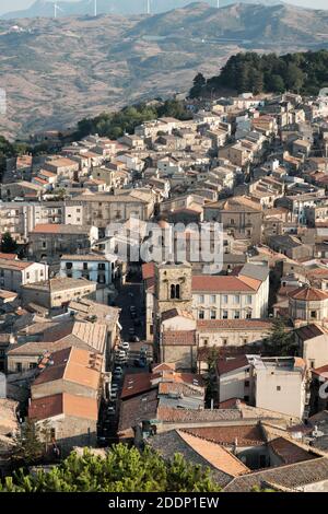 view on top roofs and bell tower of Mother Church in Mistretta Old Town of Sicily architecture and culture evidence Stock Photo