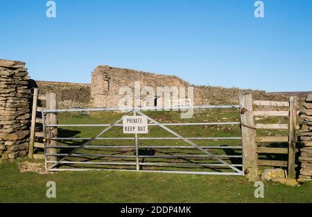 Sign Private Keep Out on metal farm gate above Stanhope, in Co. Durham, England, UK Stock Photo