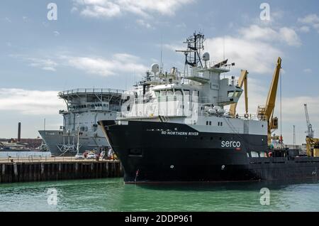 Portsmouth, UK - September 8, 2020: The Serco operated submarine rescue ship Northern River moored alongside RFA Diligence foreward repair ship in the Stock Photo