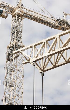 Telescopic cranes under a white sky. Construction engineering industry Stock Photo