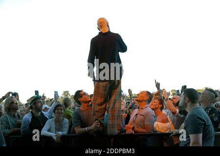 Tim Booth, lead singer from the band James, standing up and facing the crowd line,  during their set on the Main Stage at the 2016 OnBlackheath Music Festival Stock Photo