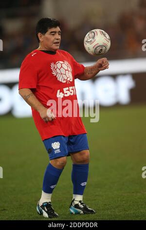 Rome, Italy - 12/10/2014: Diego Armando Maradona in action during the friendly match 'United for Peace' dedicated to Pope Francis at the Olympic stadium in Rome Stock Photo