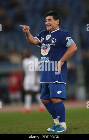 Rome, Italy - 12/10/2014: Diego Armando Maradona in action during the friendly match 'United for Peace' dedicated to Pope Francis at the Olympic stadium in Rome Stock Photo