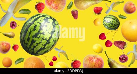 Flying fruits and berries on a yellow background with place for text. Bright poster, poster. Stock Photo