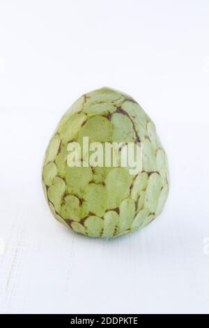 Custard apple on a white wooden table with copy space Stock Photo