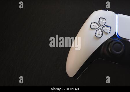 Video games white gaming controller isolated on dark background top view Stock Photo