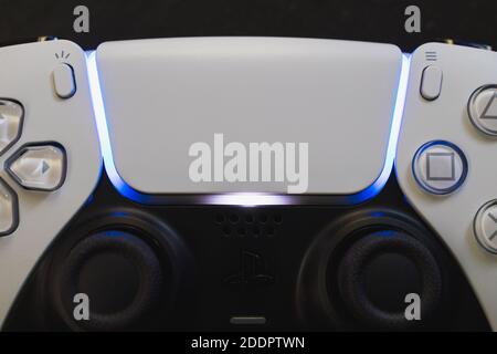 LONDON - NOVEMBER 24, 2020: PlayStation 5 video games console and PS5 controller Stock Photo