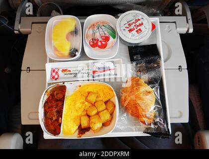 A set of food for a passenger on an Emirates airline flight. Stock Photo