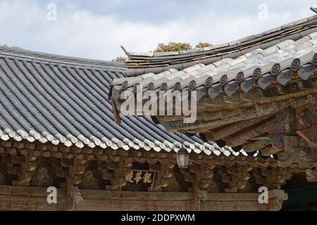 Roofs of Tongdosa Temple near Yangsan, South Gyeongsang Province, Korea. Inscription: 龍華殿 'Maitreya Hall' Stock Photo