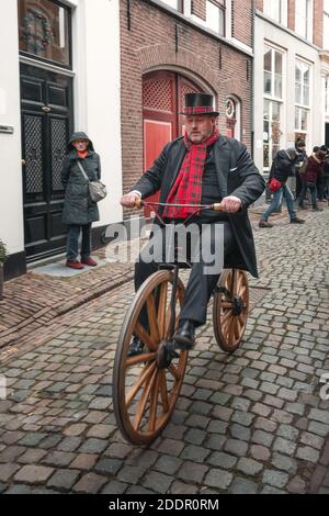 Deventer, Netherlands, December 15, 2018: demonstration  of penny-farthing rider during the Dickens Festival in Deventer in The Netherlands Stock Photo