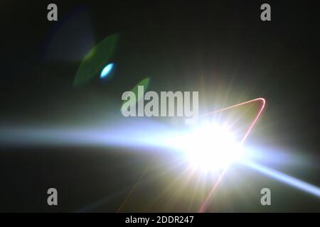 flashlight of mobile phone in dark night Stock Photo