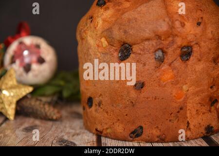 panettone classic italian cake for christmas holiday on black background and decoration Stock Photo