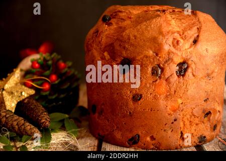 panettone classic italian cake for christmas holiday on black background and decoration Stock Photo