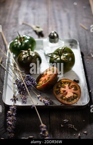 Sweet tomato salad.Healthy food and drink.Delicious vegetable.Wooden table. Stock Photo