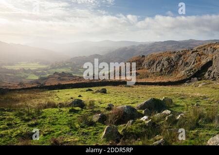 Autumnal misty view over the Duddon Valley from Tongue House High Close in the Lake District National Park, Cumbria, England. Stock Photo