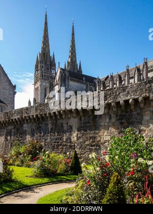 Historic wall and garden in the Old Town close to the Cathedral of St Corentin in Quimper the capital of Finisterre in Brittany north west France. Stock Photo