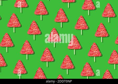 Seamless christmas pattern from sweet tree on green background. Stock Photo