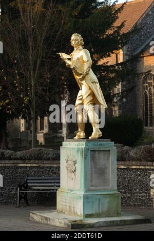 Thomas Paine gold gilded statue holding the Rights of Man, regilded November 2020, Thetford, Norfolk. unsharpened Stock Photo