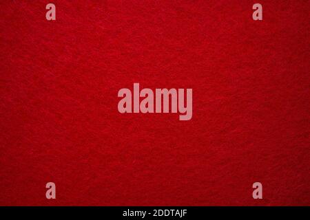 Felt background in red color useful for Christmas backgrounds. Hight quality photo Stock Photo
