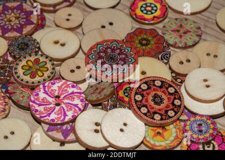 Cute Coloured Buttons on a Desk Close Up Stock Photo