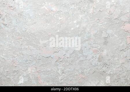 Light gray stucco background texture with pink and blue tones, with copy space Stock Photo