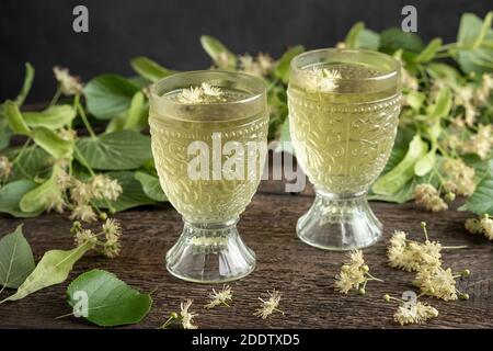 Two cups of linden flower tea on a table Stock Photo