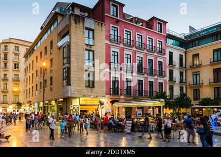 Bars and terraces in the lively Plaza del Obispo - Bishop's Square, at dusk. Málaga, Andalucia, Spain, Europe Stock Photo