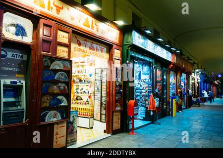 Souvenir shops under the arcades of the Plaza Mayor. Madrid, Comunidad de Madrid, Spain, Europe Stock Photo