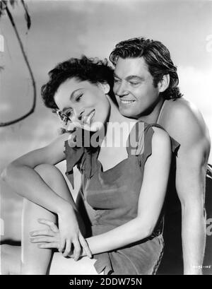 MAUREEN O'SULLIVAN and JOHNNY WEISSMULLER publicity portrait by CLARENCE SINCLAIR BULL for TARZAN'S SECRET TREASURE 1941 director RICHARD THORPE based on characters created by Edgar Rice Burroughs Metro Goldwyn Mayer Stock Photo