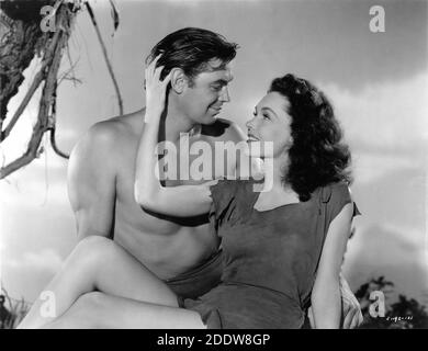 MAUREEN O'SULLIVAN and JOHNNY WEISSMULLER publicity portrait by CLARENCE SINCLAIR BULL for TARZAN'S SECRET TREASURE 1941 director RICHARD THORPE based on characters created by Edgar Rice Burroughs Metro Goldwyn Mayer Stock Photo