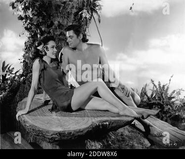 MAUREEN O'SULLIVAN and JOHNNY WEISSMULLER publicity portrait by CLARENCE SINCLAIR BULL for TARZAN'S SECRET TREASURE 1941 director RICHARD THORPE based on characters created by Edgar Rice Burroughs Metro Goldwyn Mayer Stock Photo