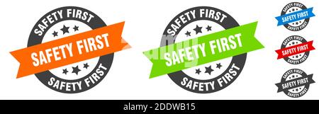 safety first ribbon. safety first round red sign. safety first