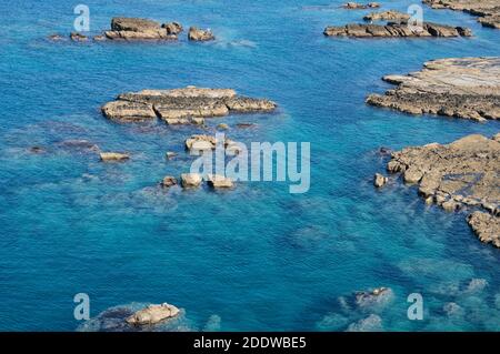Stones in the water. Seascape top view. Stock Photo
