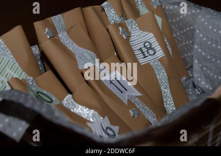 Handmade advent calendar with brown paper bags Stock Photo