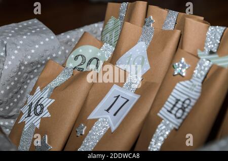 Handmade advent calendar with brown paper bags Stock Photo