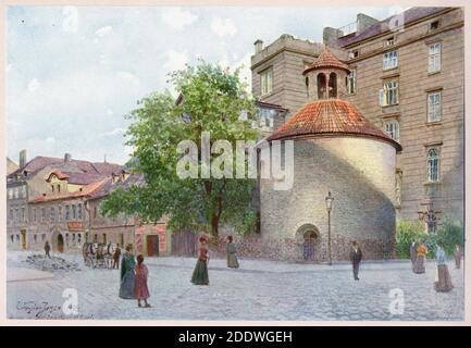 Romanesque rotunda of the Finding of the Holy Cross (Rotunda Nalezení svatého Kříže) on the corner of Konviktská Street in Staré Město (Old Town) in Prague depicted in the watercolour painting by Czech painter Václav Jansa (1899) from his cycle Old Prague (Stará Praha) ordered by the Prague Magistrate and published in the beginning of the 20th century by Czech publisher Bedřich Kočí. Stock Photo