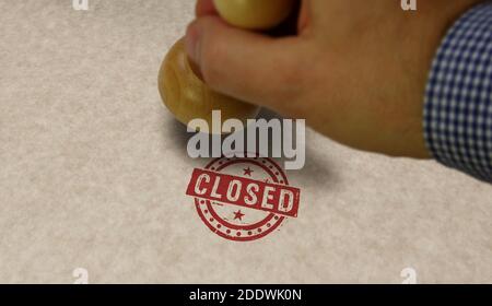 Closed stamp and stamping hand. Bankruptcy and business close concept. Stock Photo