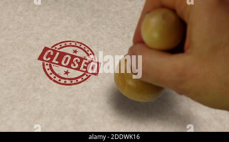 Closed stamp and stamping hand. Bankruptcy and business close concept. Stock Photo