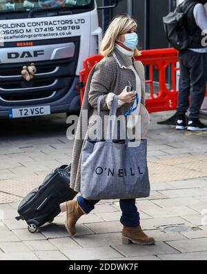 Kate Garraway wearing a face mask arrives at The Global Radio Studios In London. Stock Photo